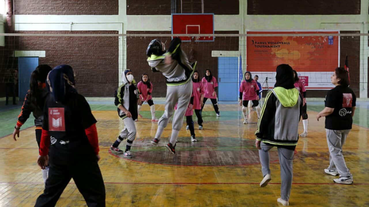Women playing volleyball in Kabul