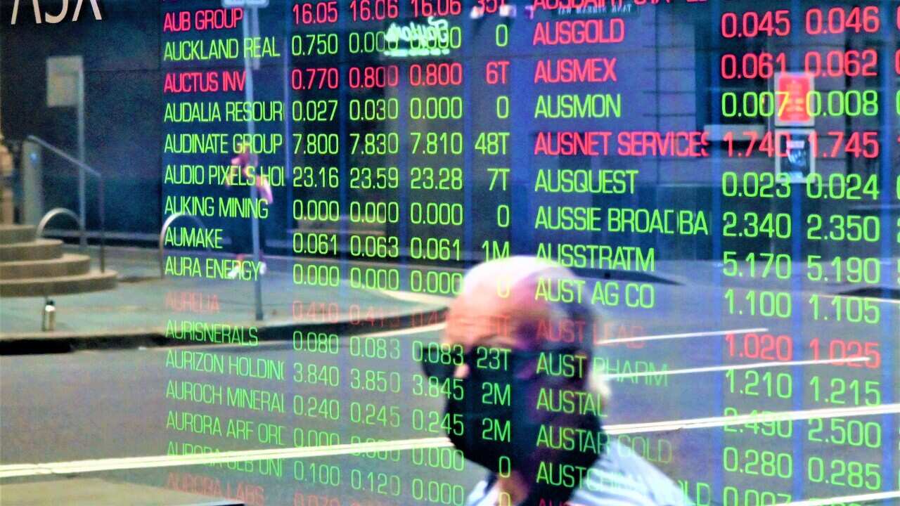 A digital board at the Australian Securities Exchange (ASX) is seen in Sydney.