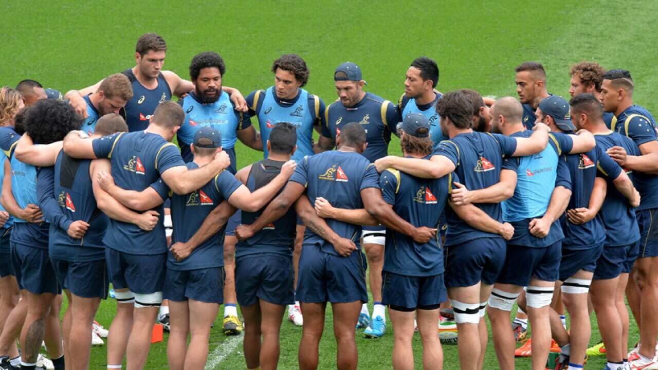 The Australian Wallabies team huddle