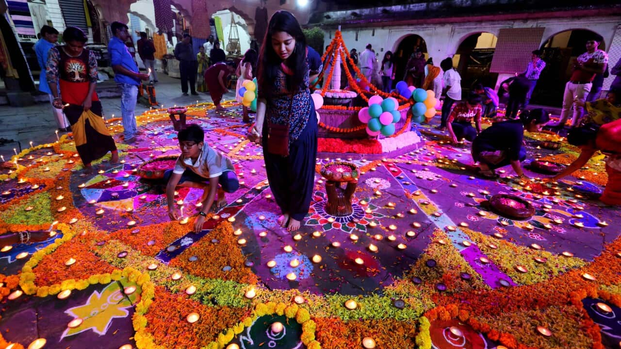 Indian people light oil lamps during the Light Festival as part of the Diwali festival celebrations in Bhopal, India.