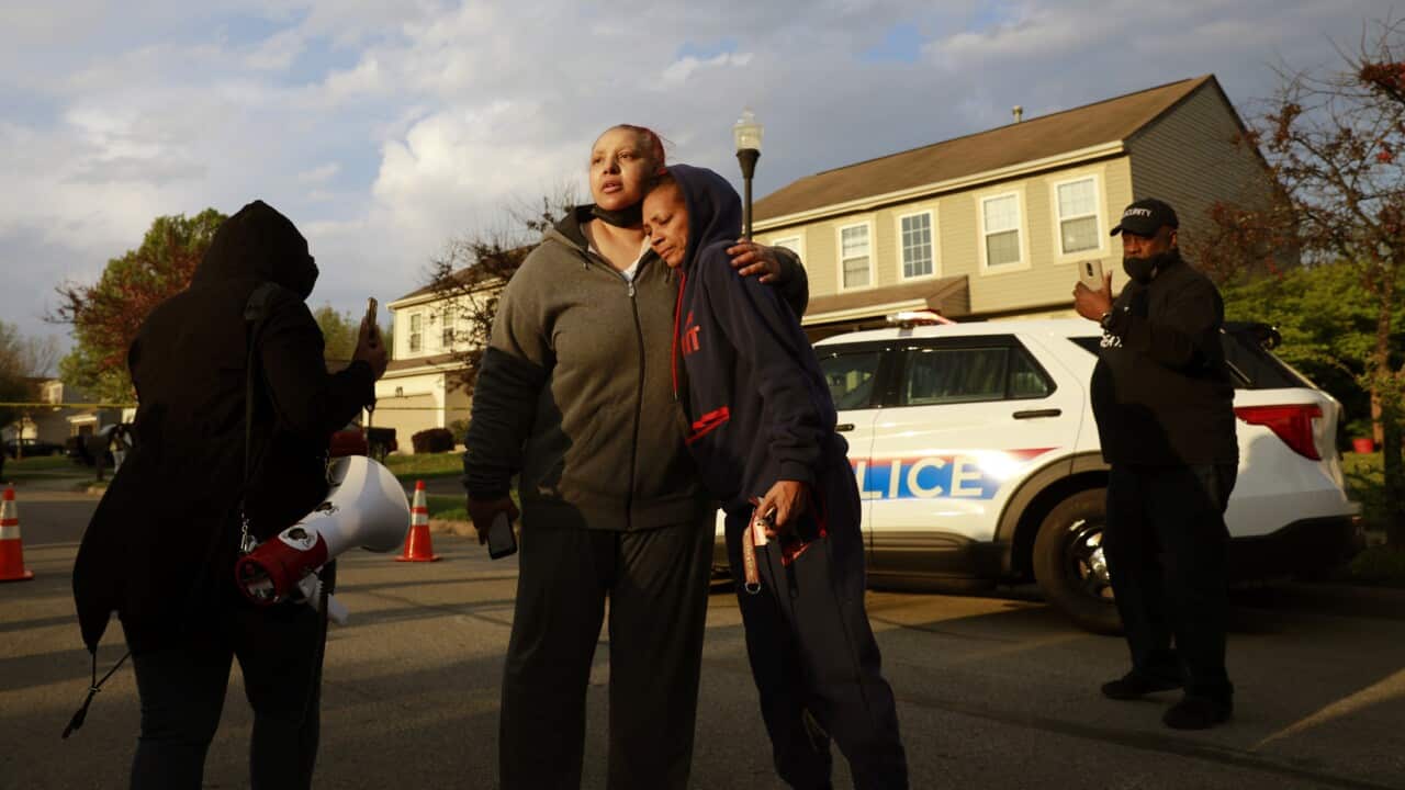 Hazel Washington is embraced after addressing a crowd about her anger at the Columbus Police at the shooting of her niece following a fatal police shooting.
