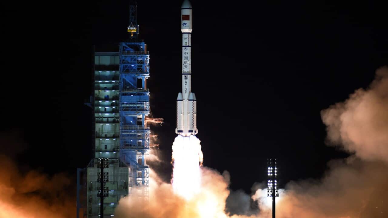 The Long March 7 rocket carrying the Tiangong-2 module