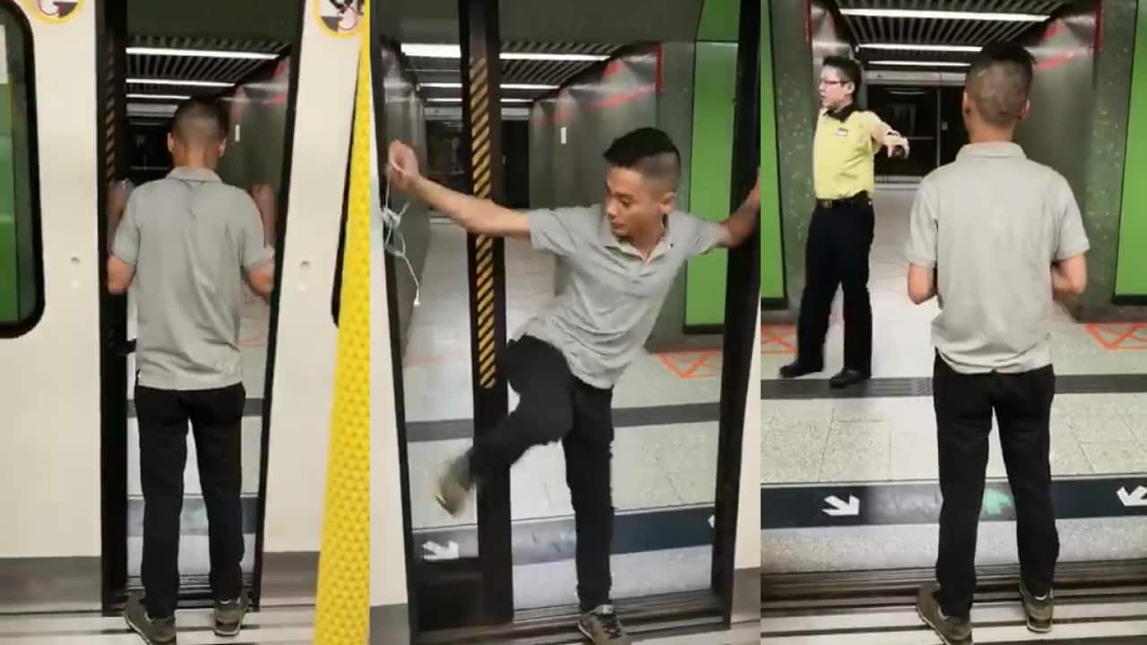 Hong Kong man blocks MTR door closing