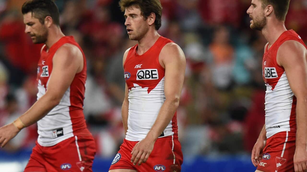 A dejected Heath Grundy, Nick Smith and Toby Nankervis