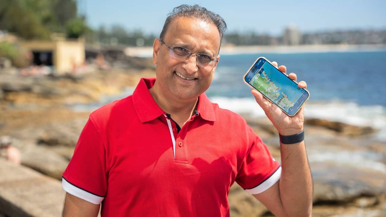 Mrudul Vasavada shows his SharkSmart app (Spencer Austad, SBS).jpg