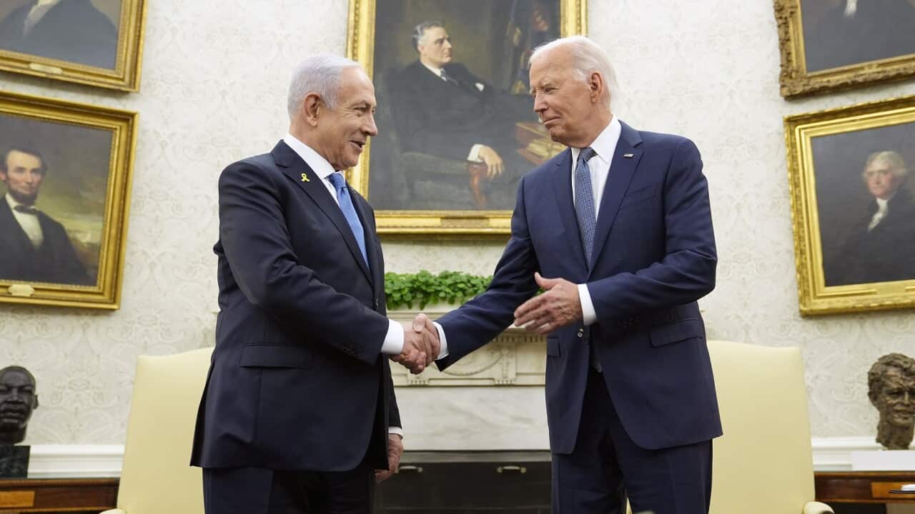 President Joe Biden, right, shakes hands with Israeli Prime Minister Benjamin Netanyahu (AAP)