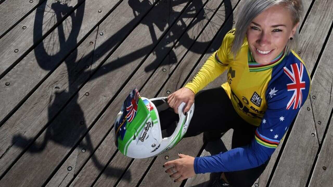Caroline Buchanan poses for photographs in Canberra.