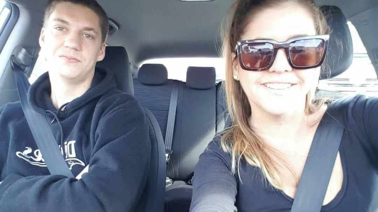 Haylee O'Connell taking a selfie of her and her brother Corey while sitting in a car.