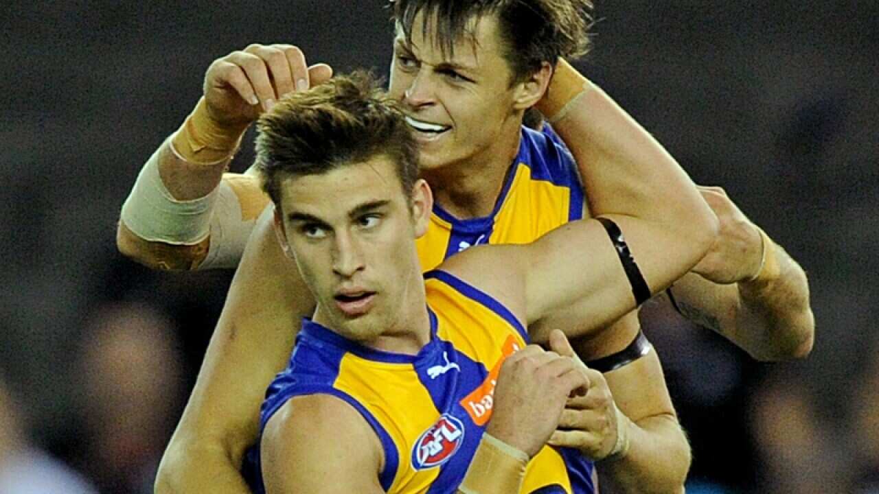 Elliot Yeo of the Eagles is congratulated by team-mates