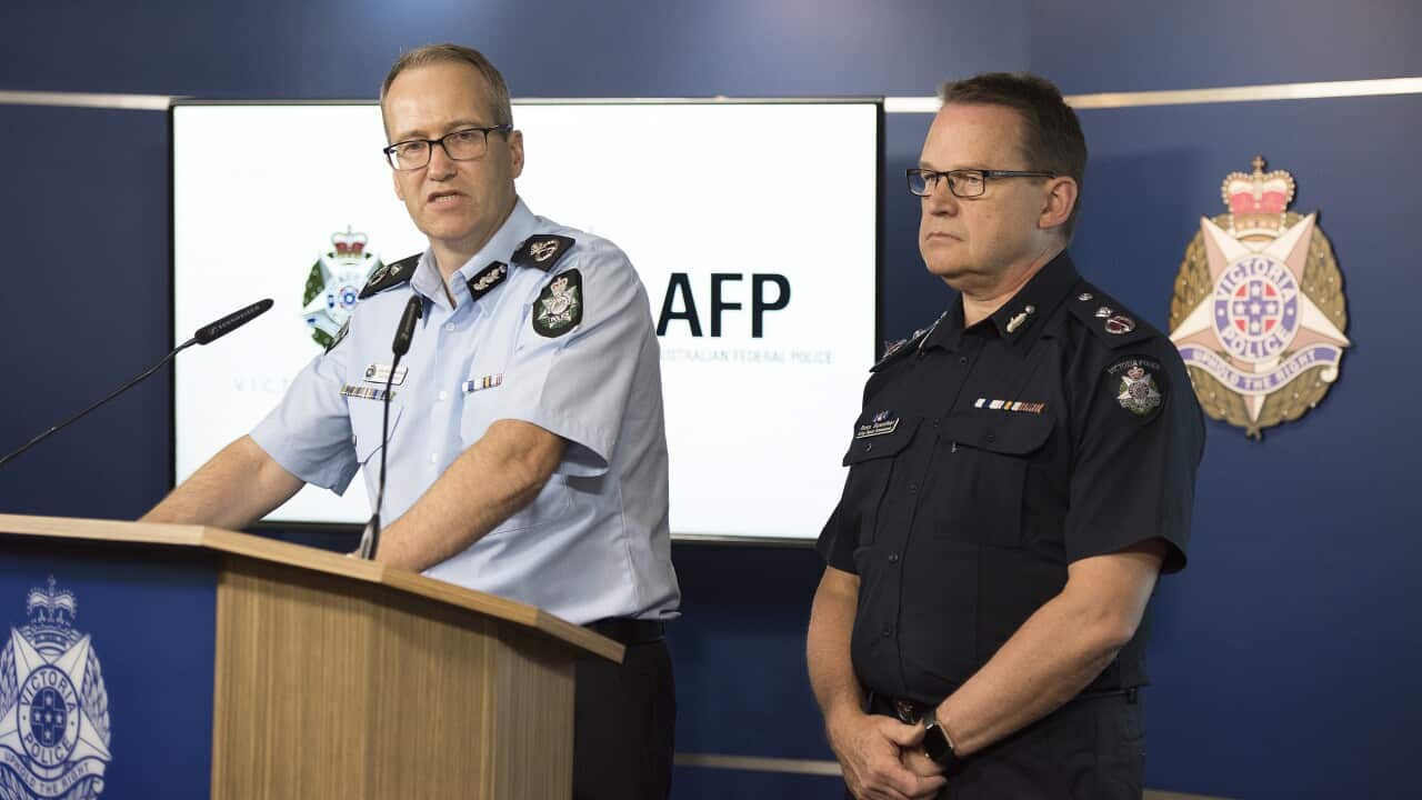 AFP Acting Deputy Commissioner National Security Ian McCartney and Victoria Police Acting Deputy Commissioner Ross Guenther.