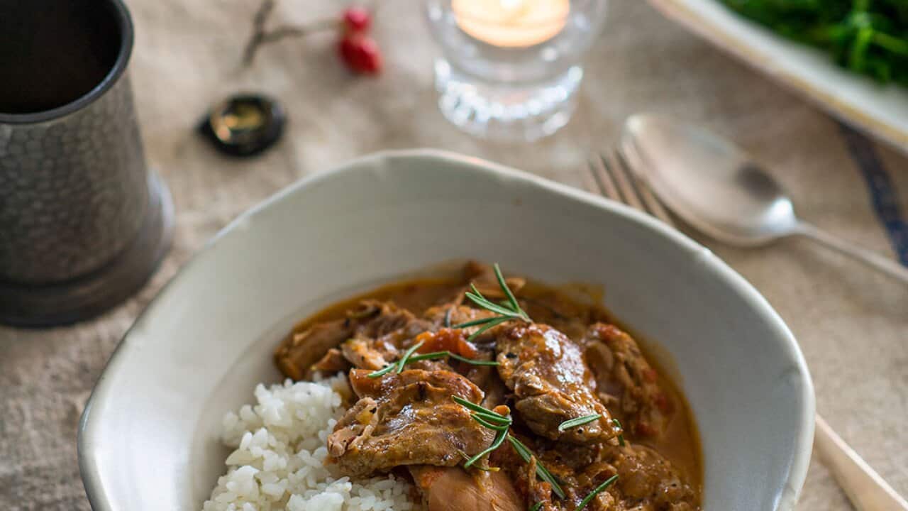 Chicken thigh casserole with rosemary, garlic, tomato and anchovies