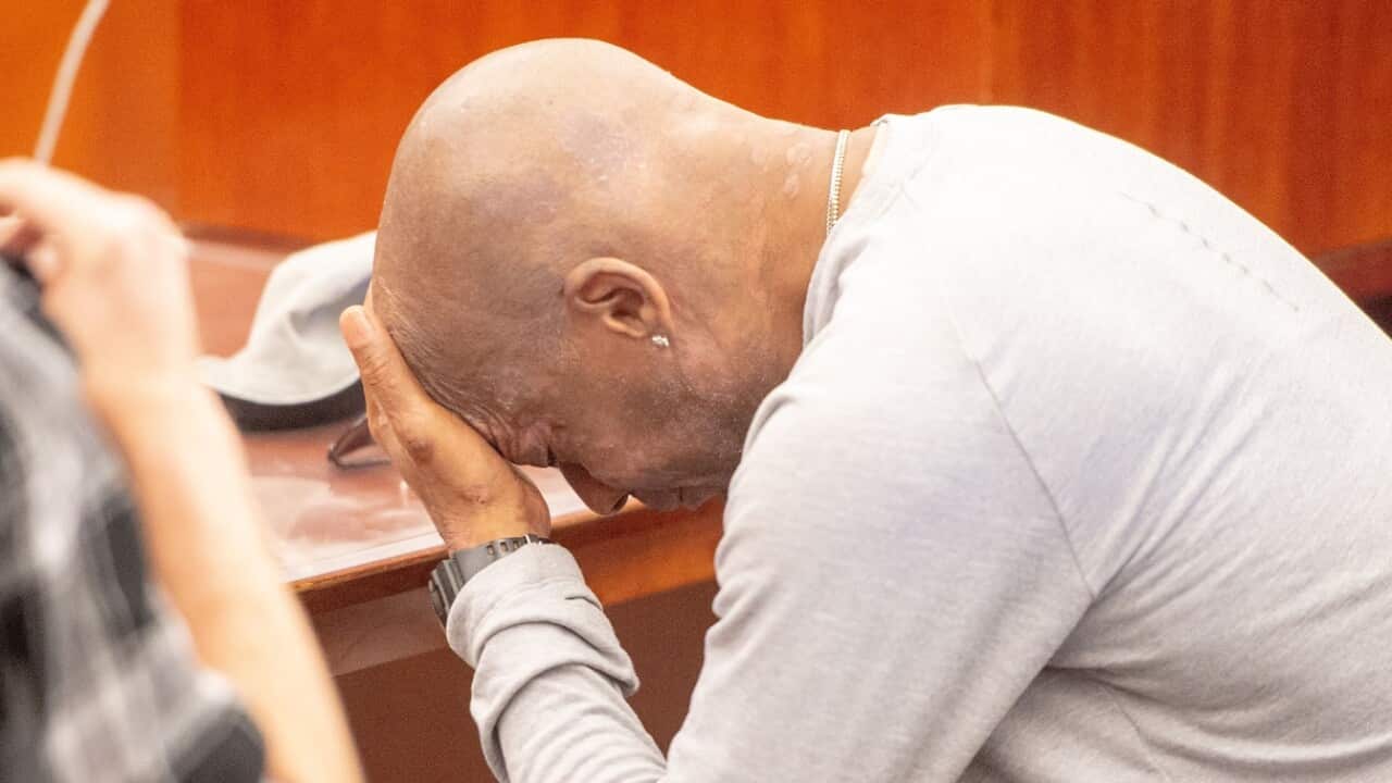 Plaintiff Dewayne Johnson reacts after hearing the verdict to his case against Monsanto 