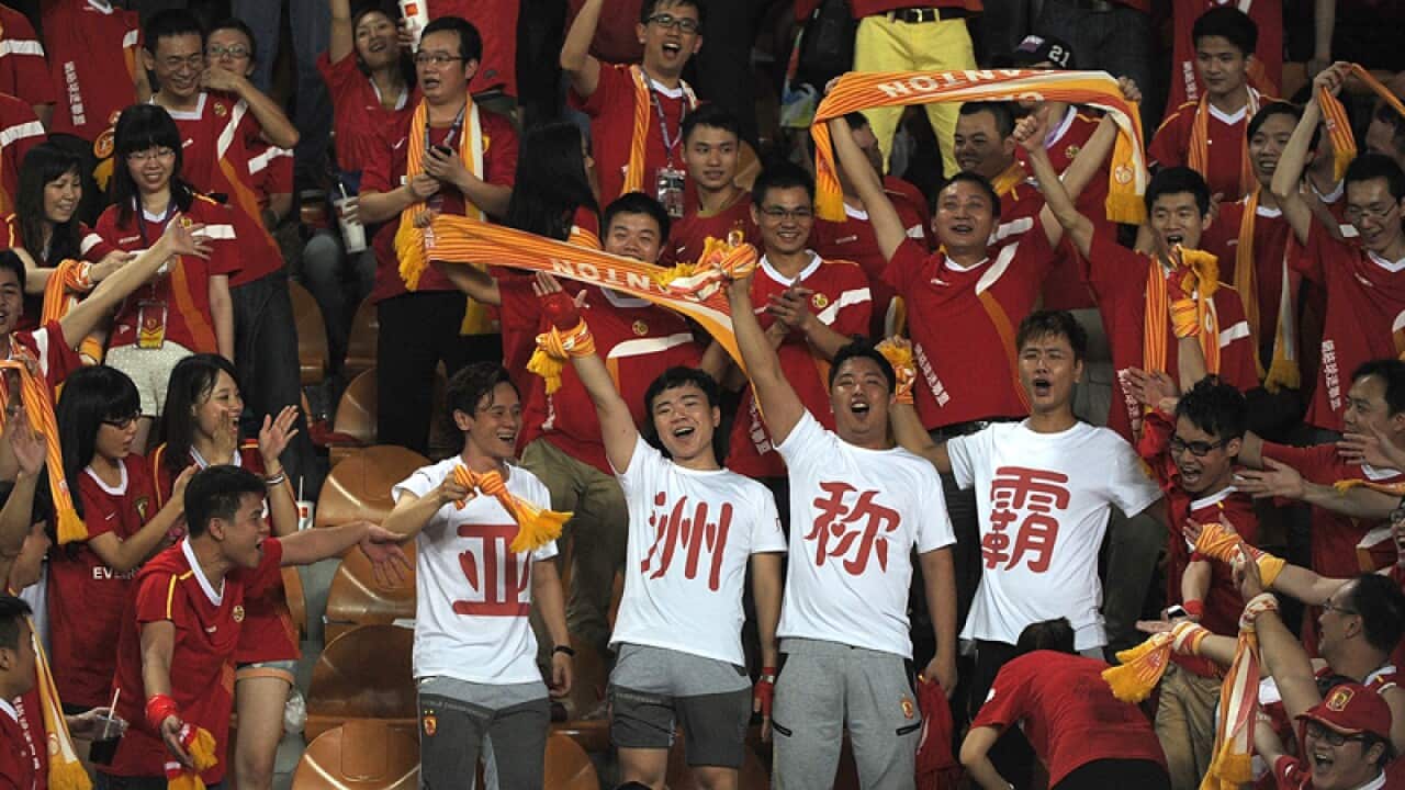 Soccer fans of China's Guangzhou Evergrande