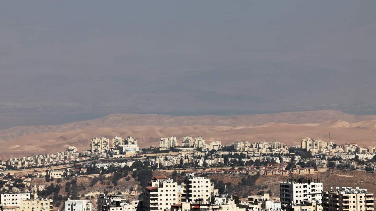 What is Israel's E1 West Bank settlement plan and why is it being condemned?