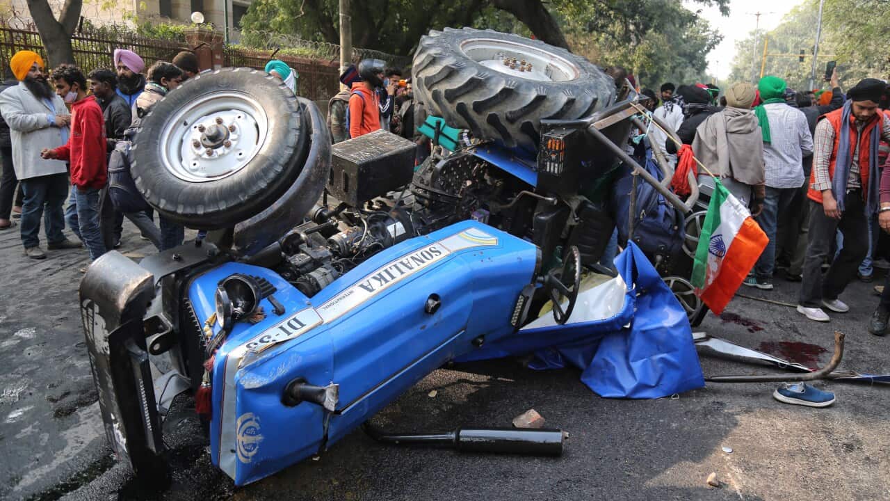 n overturned tractor after an accident during the farmers tractor rally near ITO on Republic Day, on January 26, 2021 in New Delhi, India.