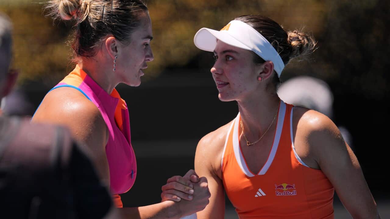 Aryna Sabalenka, left, of Belarus is congratulated by Iva Jovic of the U.S. following their quarterfinal match at the Australian Open tennis championship in Melbourne