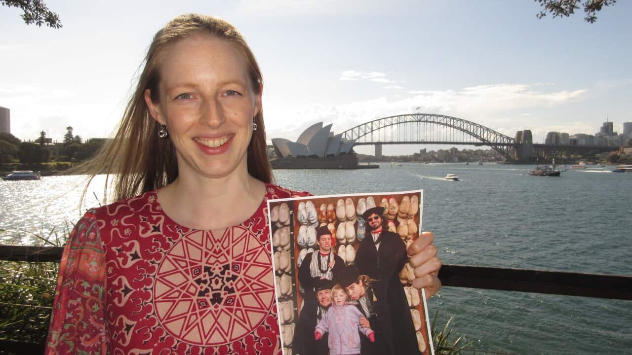 Sonya Shelter from Sydney posing with 'her' Red Hot Chili Peppers photo taken in 1990