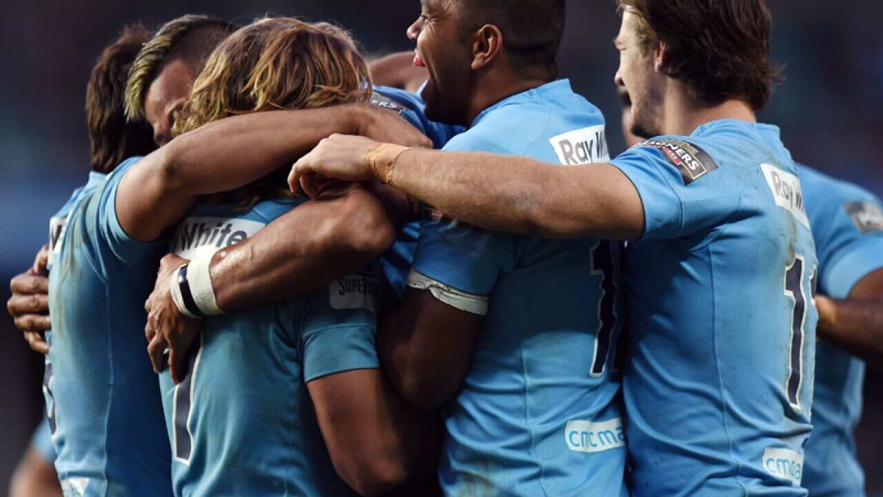 The Waratahs celebrate