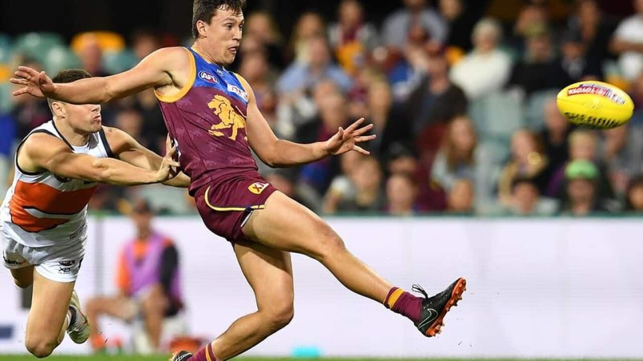 File image of Hugh McCluggage of the Lions kicking the ball.