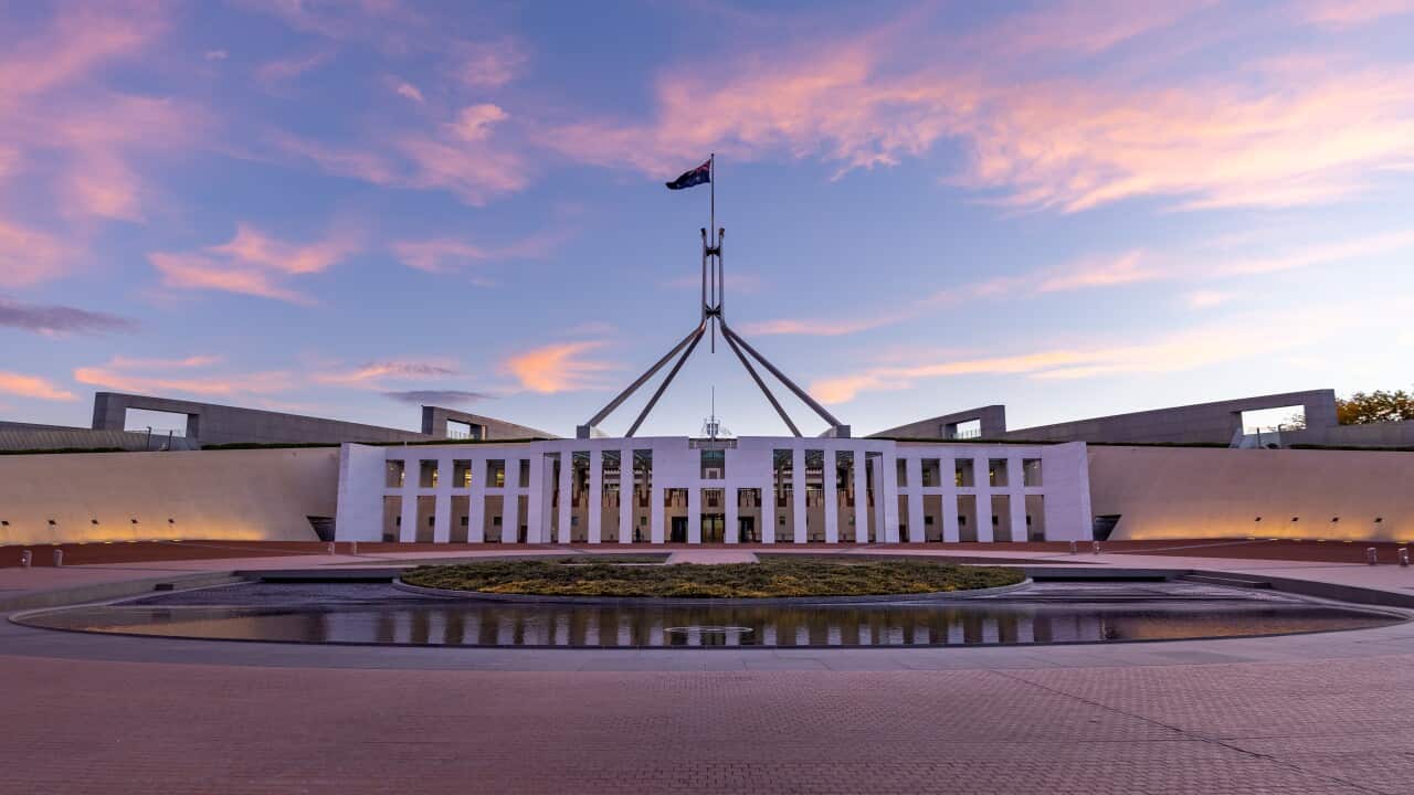 A sunset wide view of federal parliament house at Canberra.