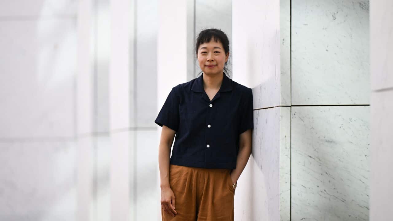 Au works part-time at a Melbourne library. She’s just won ,000 for this book Au works part-time at a Melbourne library. She’s just won ,000 for this book