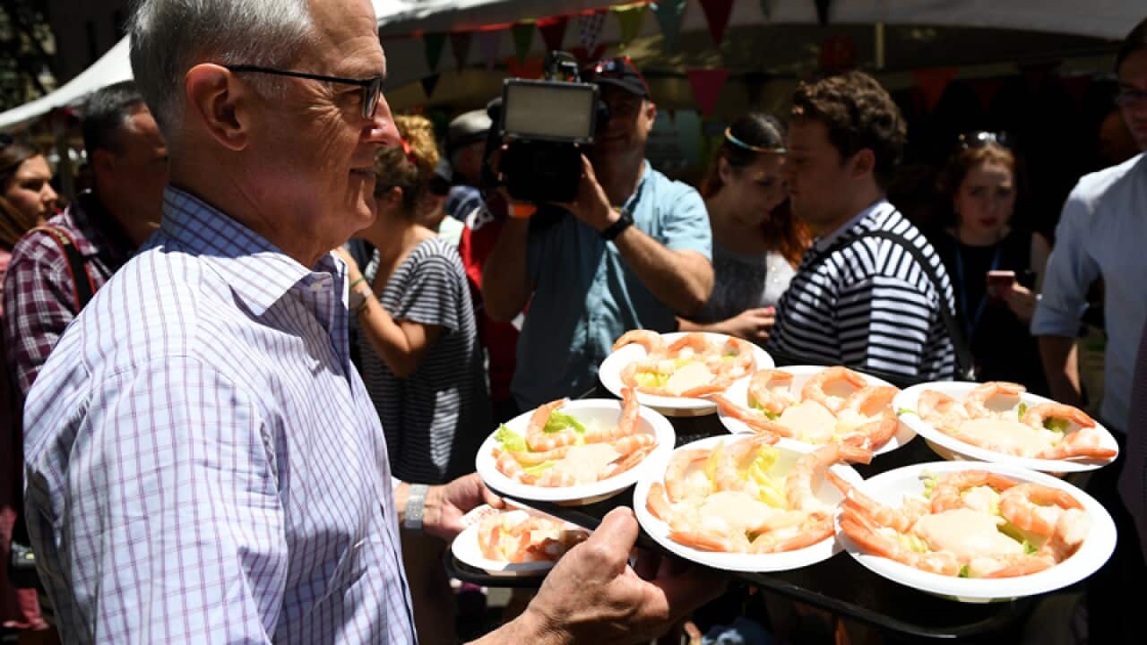 Malcolm Turnbull helps serve lunch at the Wayside Chapel