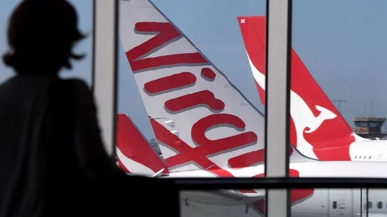 Qantas and Virgin planes seen at Sydney airport