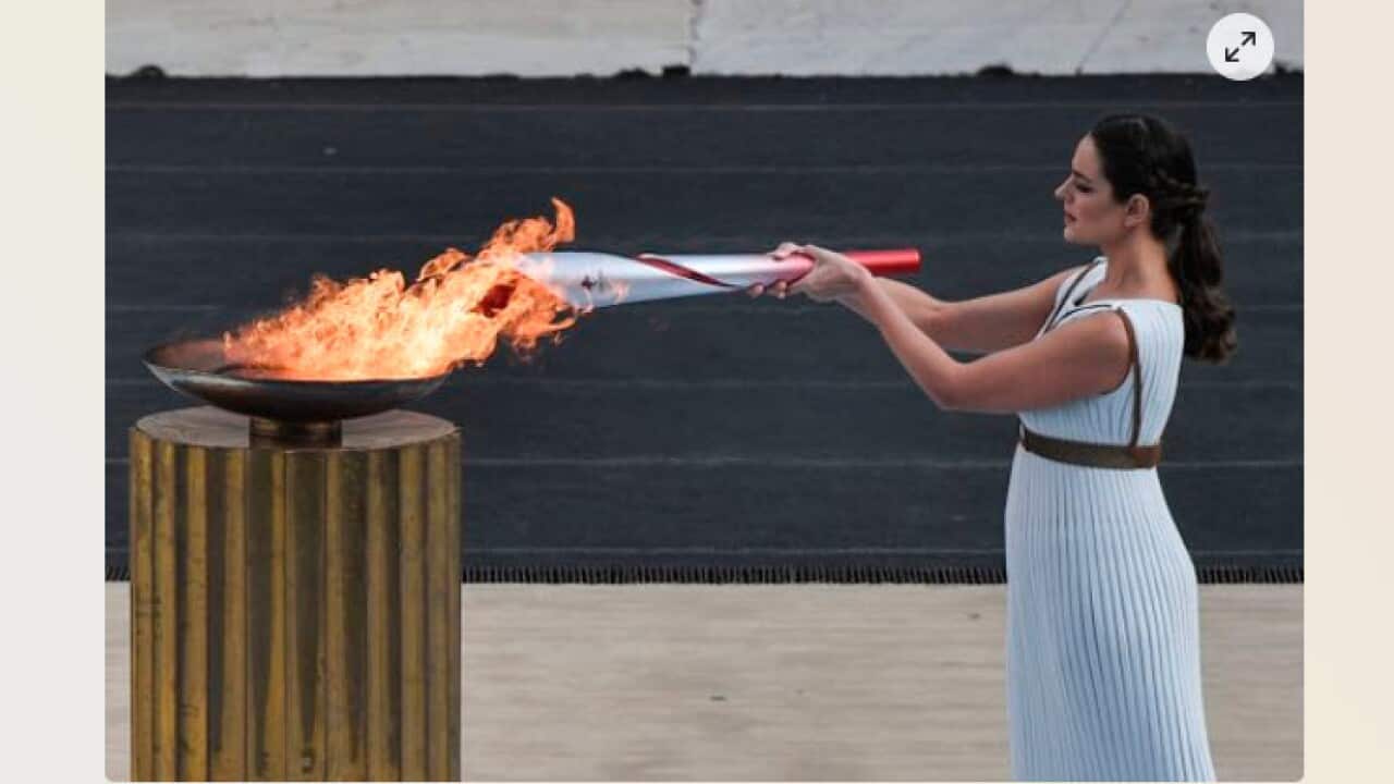 La flamme olympique - AFP.jpg