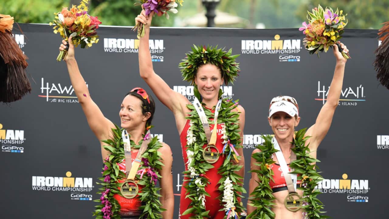 Liz Blatchford (R) celebrates at Kailua Kona