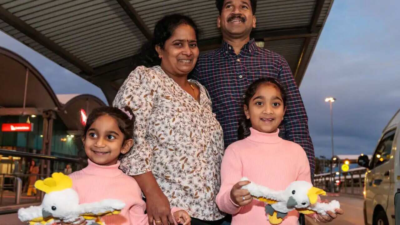 Priya and Nade Nadesalingam and their daughters Kopika and Tharnicaa at Perth Airport on Wednesday, 8 June, 2022