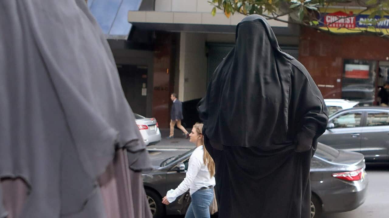 Moutia Elzahed arrives to the Downing Centre court in Sydney, Tuesday, February 20, 2018. 