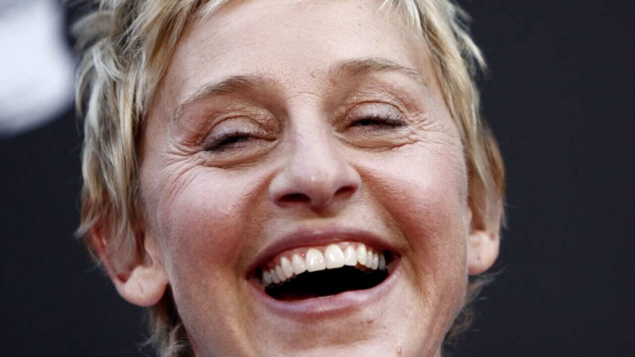 TV star Ellen DeGeneres laughs.