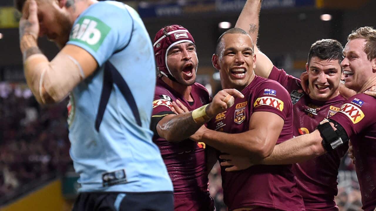 Johnathan Thurston of the Maroons celebrates
