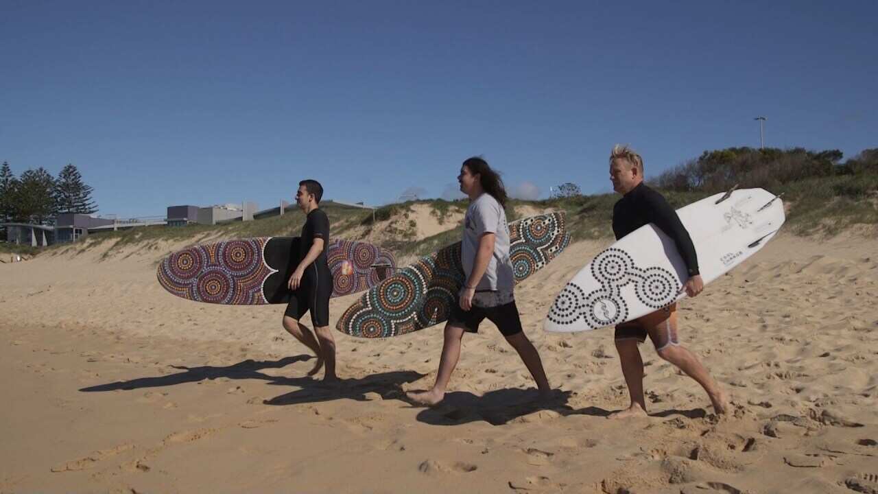 Wollongong-based Saltwater Dreamtime paints Indigenous art on surfboards.