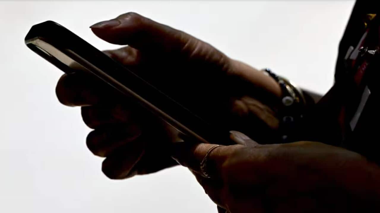 Millions of Australian workers now have the legal right to disconnect from work after hours (AAP).jpg