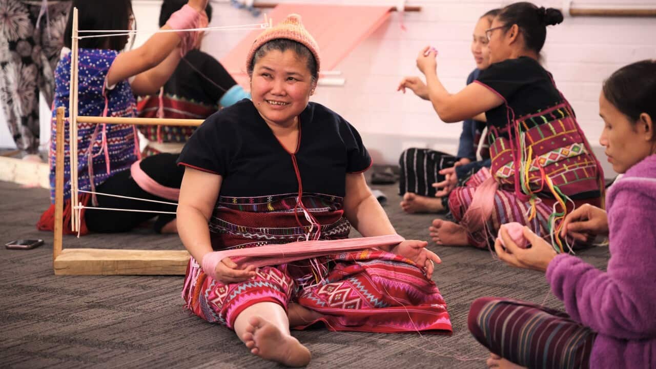 Karen women weaving at a community group in Perth (SBS Christopher Tan).jpg