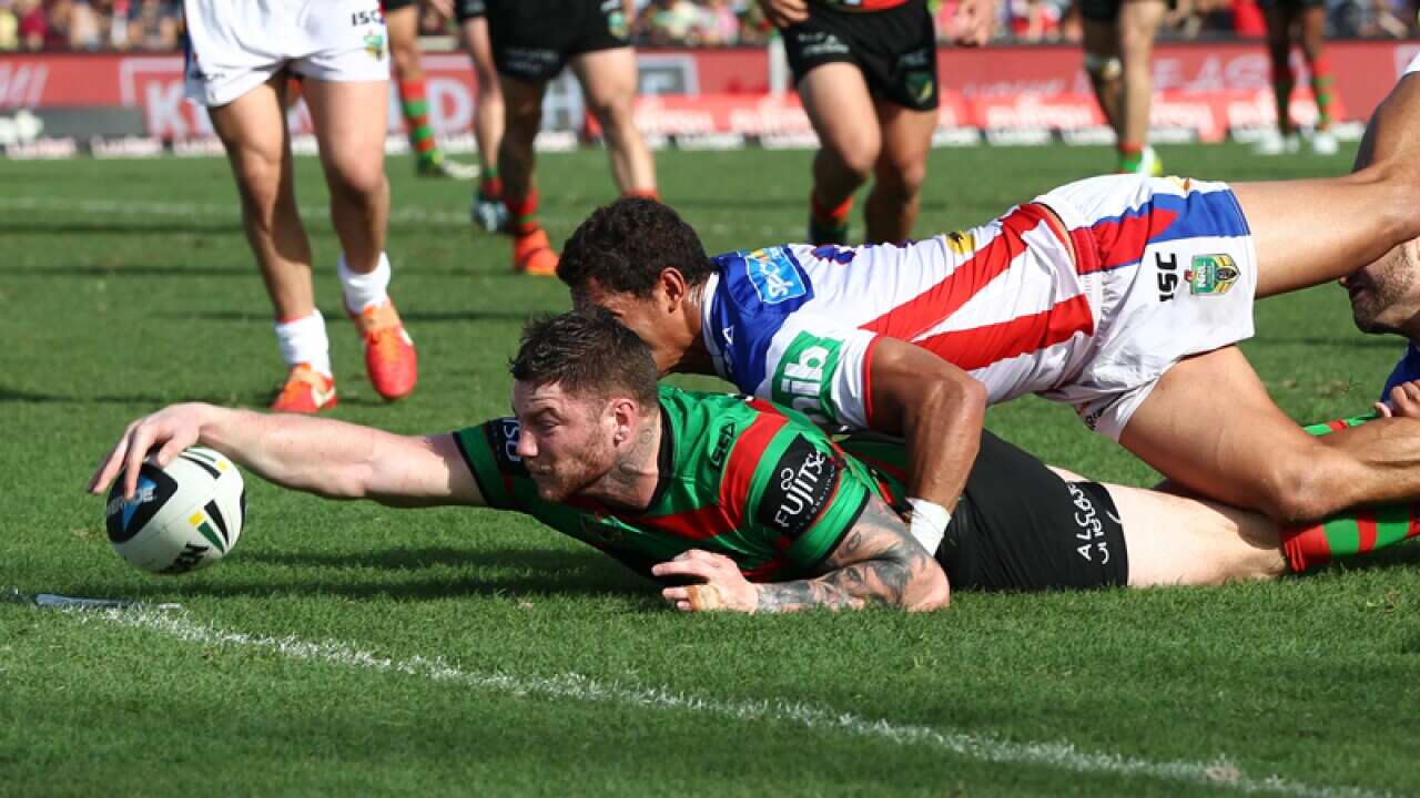 Chris McQueen scores for the Rabbitohs against the Knights