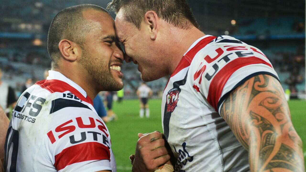 The Roosters Sam Moa and Jared Waerea-Hargreaves celebrate a win.