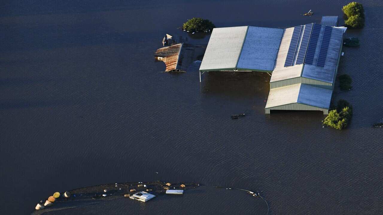 Submerged houses seen from a helicopter in flood affected areas in Windsor and Pitt Town near the Hawkesbury River.