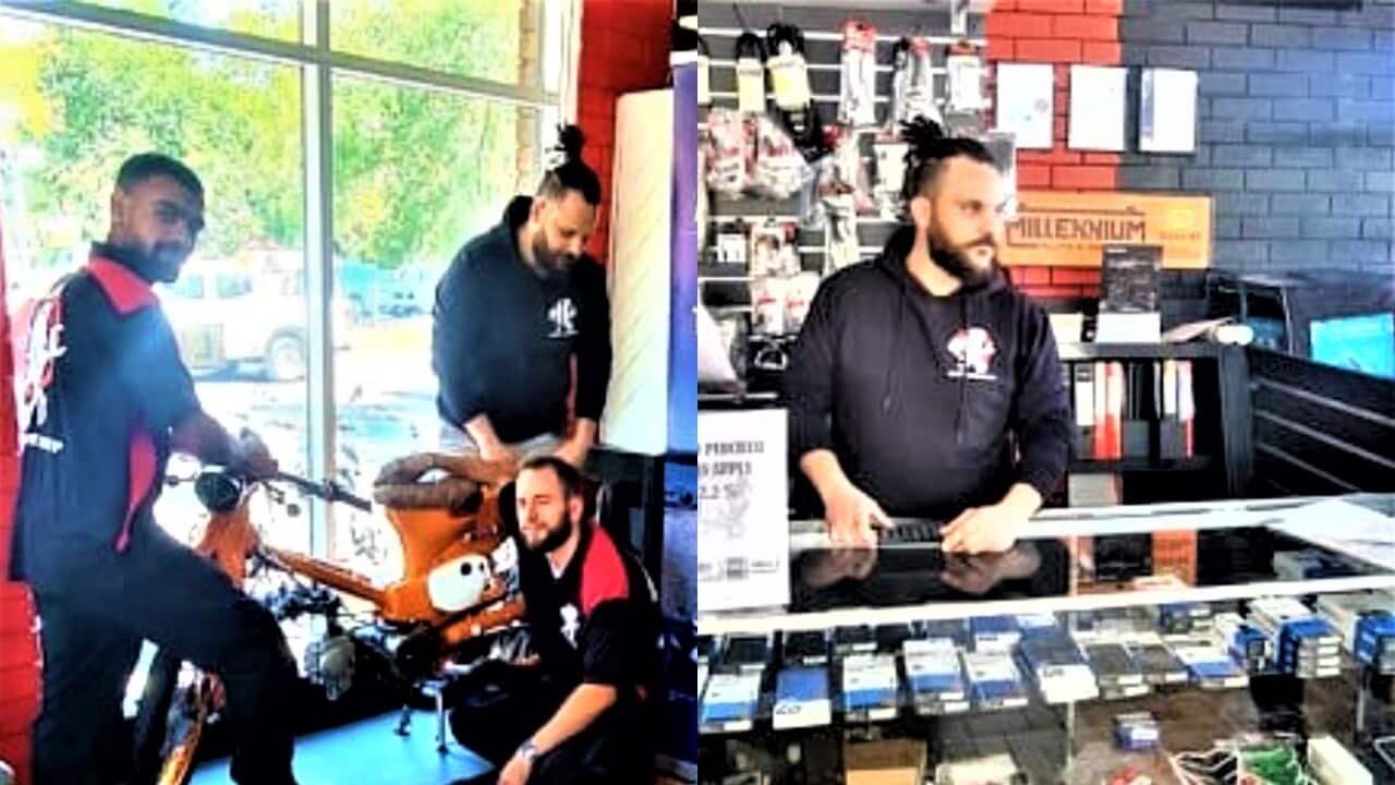 Greek Australian Dimitris Fountas at his shop with some of his colleagues.