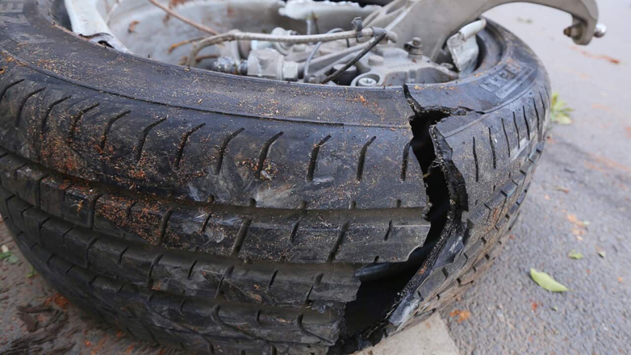 A broken tyre of the seriously-damaged