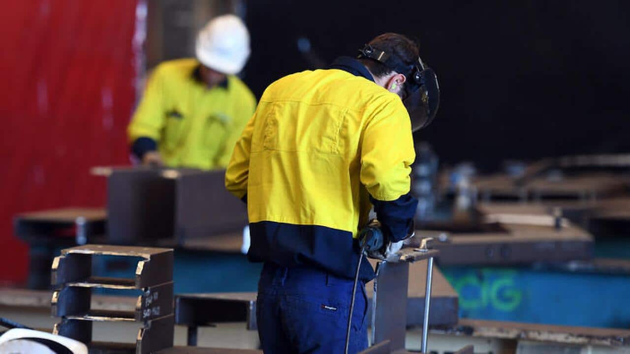 Workers are seen on the production floor at the Civmec Construction and Engineering facility in Perth, Friday, March 10, 2017. (AAP Image/Dan Peled) NO ARCHIVING