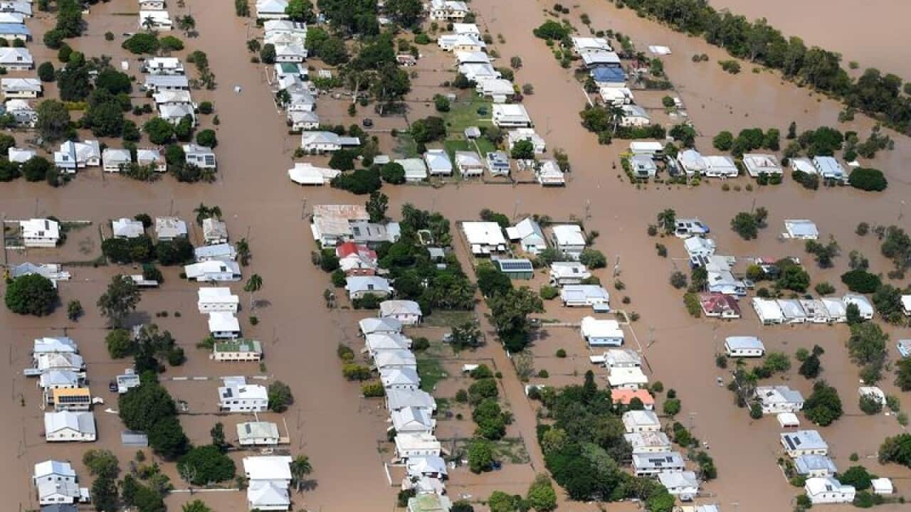 Rockhampton houses surrounded by floodwaters after Cyclone Debbie.