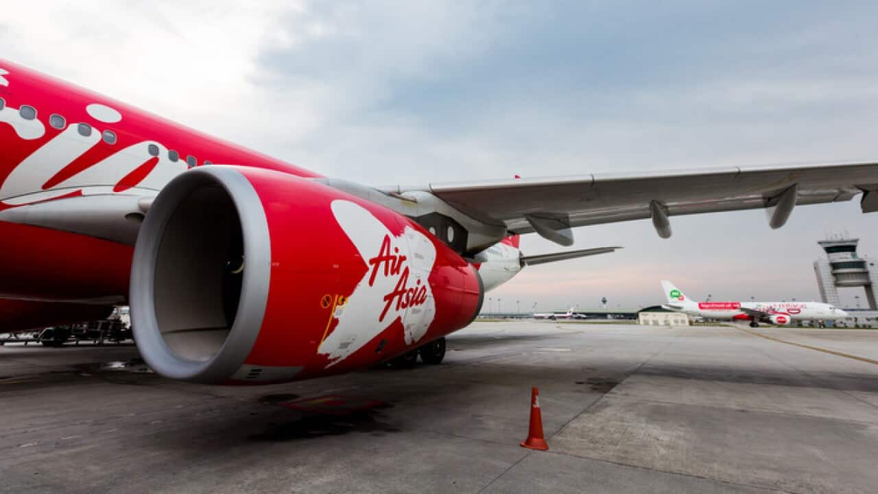 File: An Airbus passenger jet of AirAsia is parked at the Kuala Lumpur International Airport