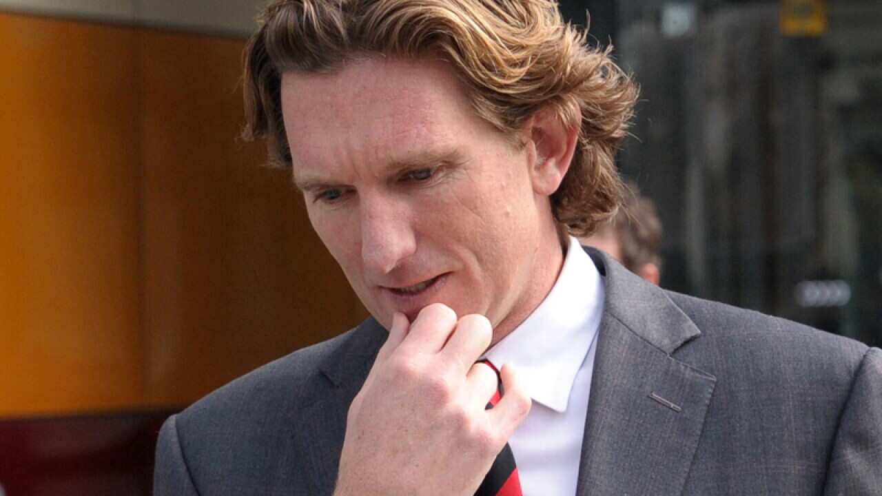 James Hird leaves the federal court.