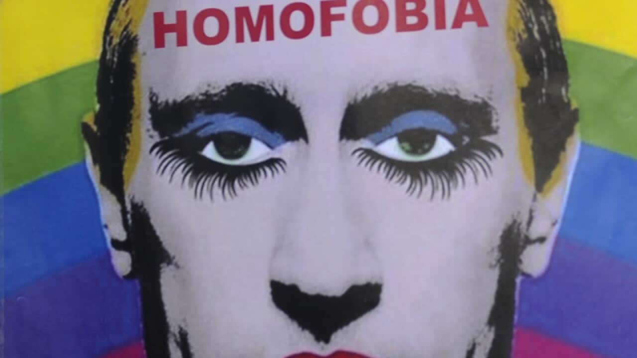 A poster with a caricature of Vladimir Putin