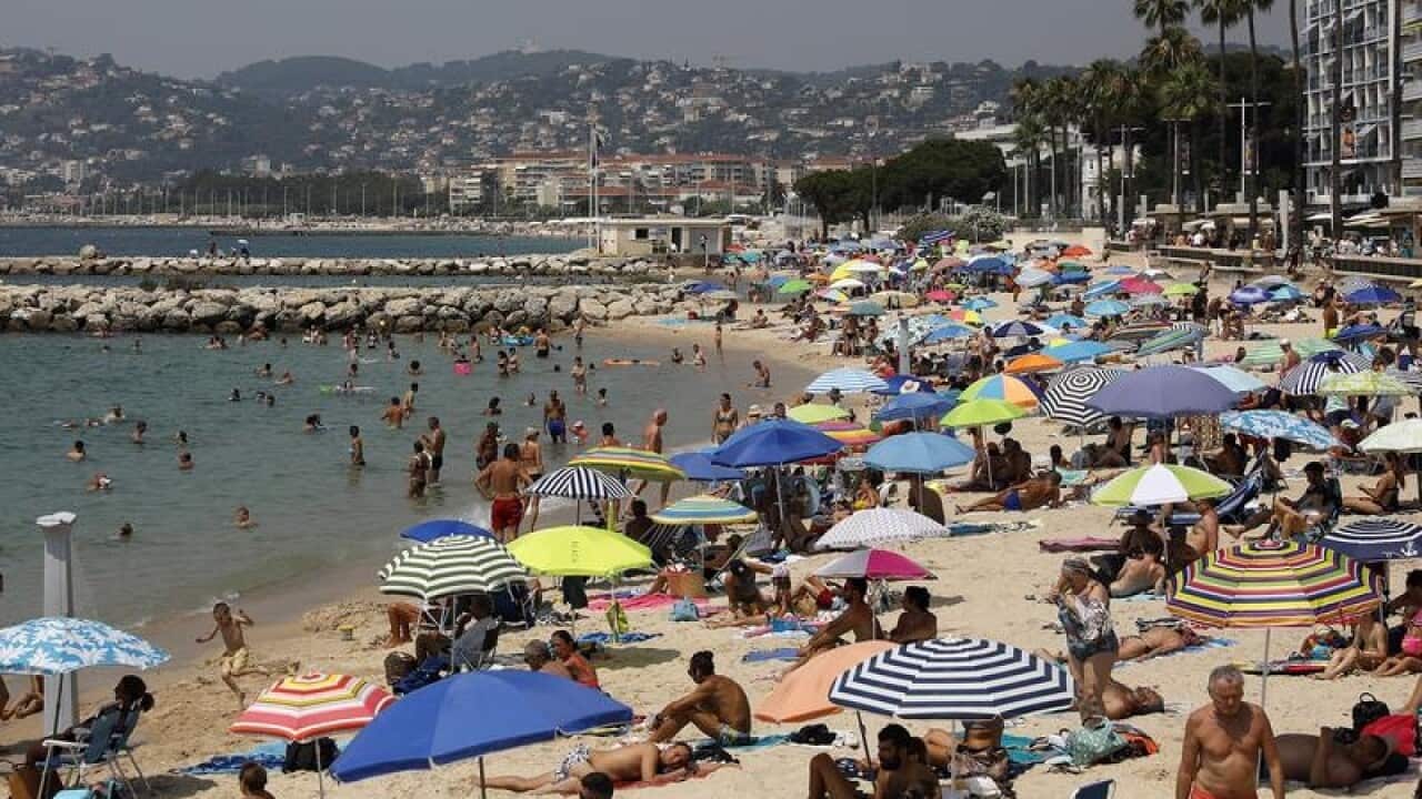 Crowds on a beach in southern France