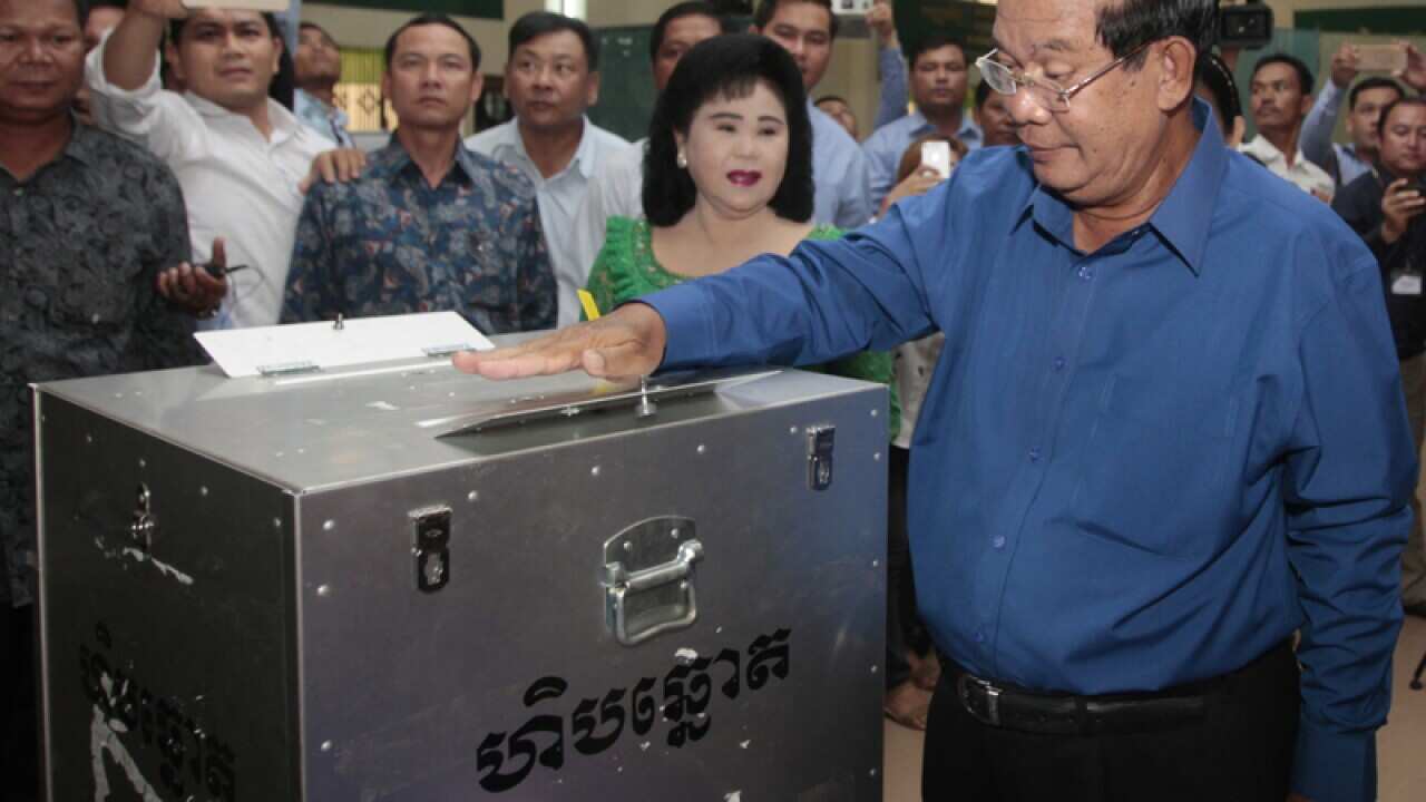 Cambodian Prime Minister Hun Sen votes in local elections