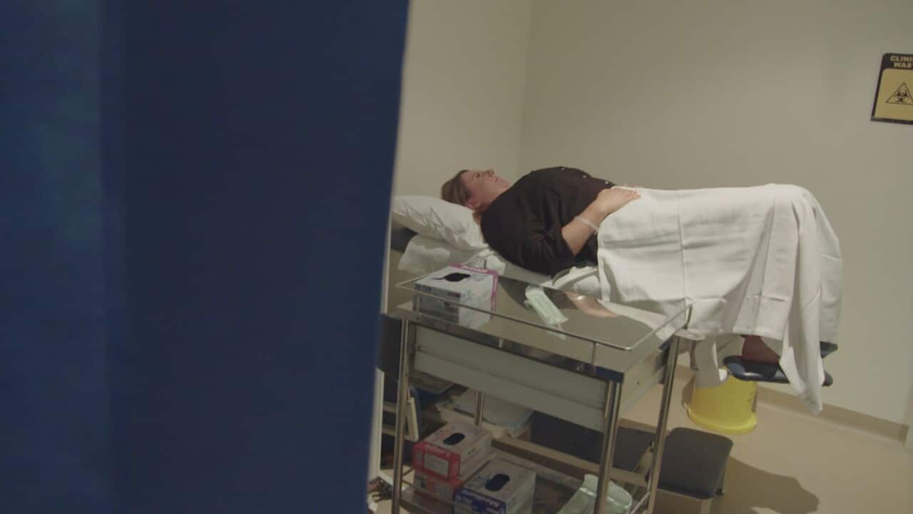 A woman undergoes IVF