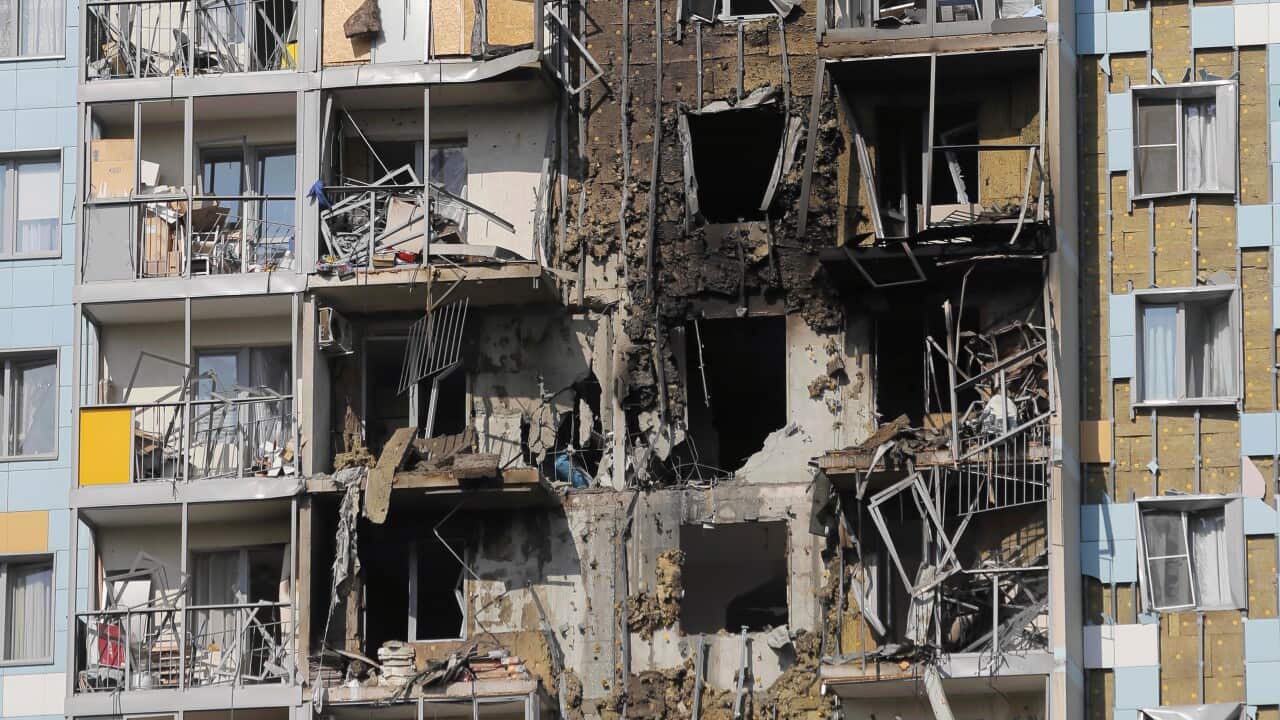 A view of the site of the damaged multi-storey residential building following an alleged Ukrainian drone attack in Ramenskoye, outside Moscow.